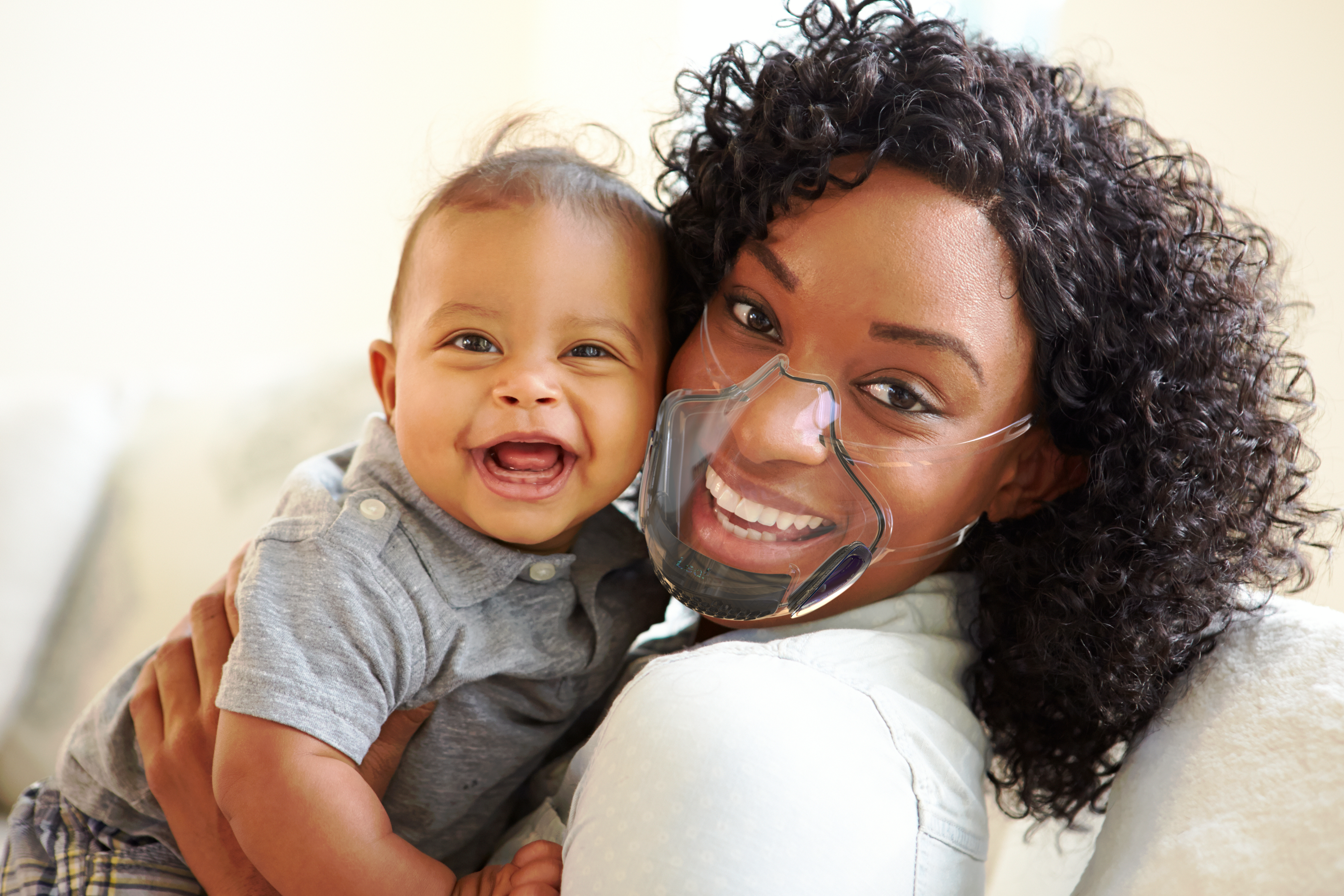 Mask mother with transparent mask and baby